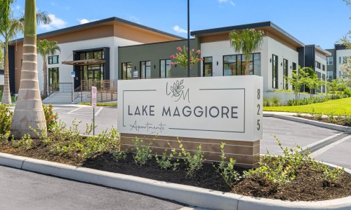 a sign in front of a building