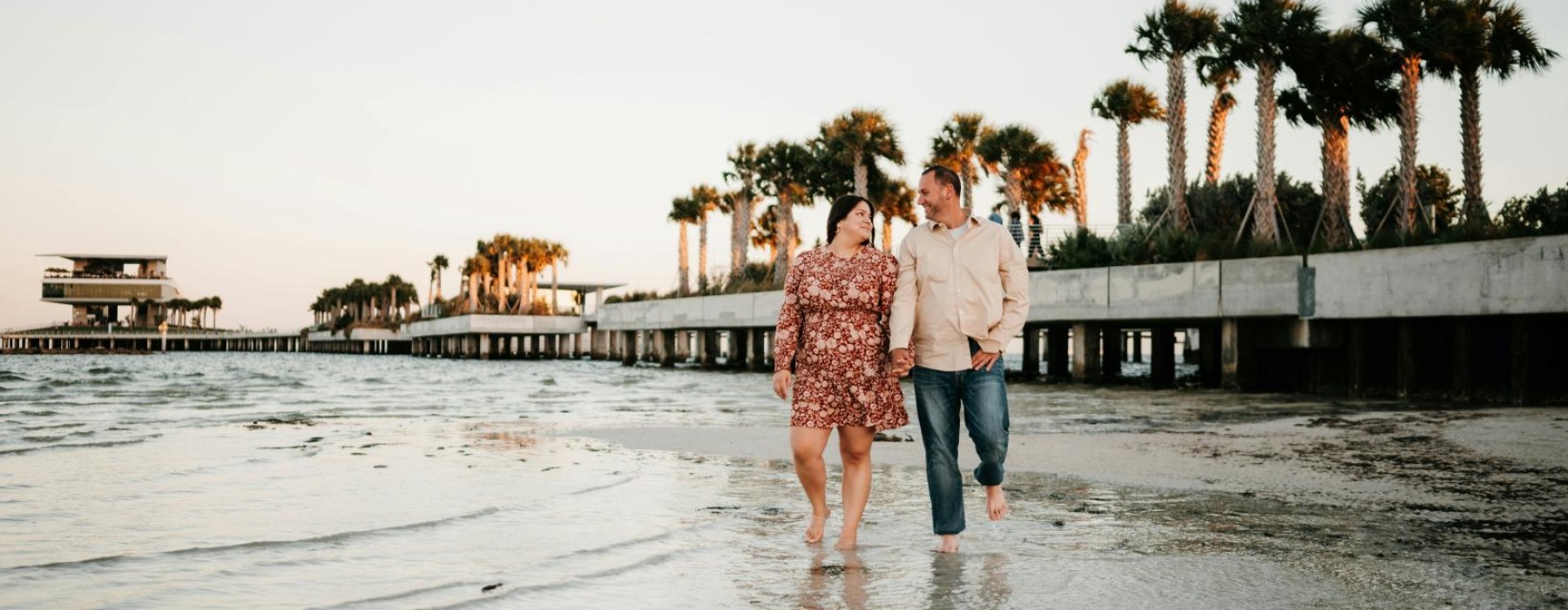 a man and woman standing in water